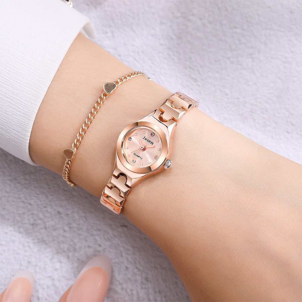 Small And Fine Bracelet Quartz Ladies Watch
 Product Information:
 
 Applicable people: Female
 
 Style: fashion
 
 Whether the source of patent: No
 
 Waterproof: No
 
 Movement type: Quartz
 
 Movement mode0Shoparamas.comFine Bracelet Quartz Ladies Watch