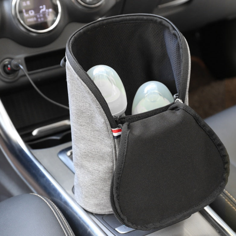 Car USB Baby Bottle Warmer Portable Travel Breast Milk Warmer
 Overview
 :
 
 The product supports car charging heating and is equipped with car charger.
 
 With a large capacity, it can hold types of bottles and heat or keep Babies & ToddlersShoparamas.comCar USB Baby Bottle Warmer Portable Travel Breast Milk Warmer