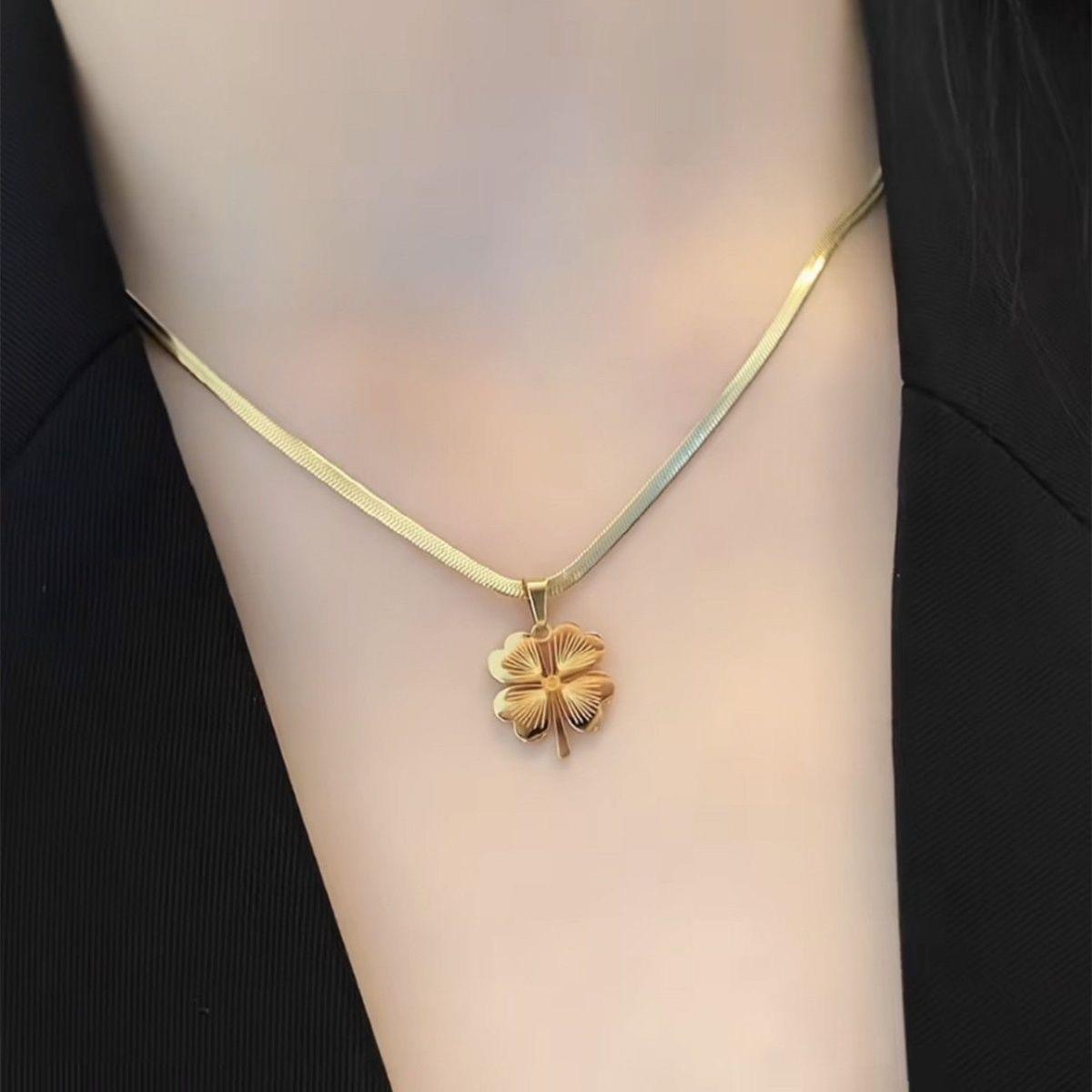 Women's Fashion Temperament Titanium Steel No Fading Clavicle Chain Ea
 Product information:
 
 Treatment Process: Electroplating
 
 Color: four-leaf clover necklace Golden-896, four-leaf clover bracelet gold 5155, earrings gold 7619
 Women's JewelryShoparamas.comFading Clavicle Chain Earrings Suit