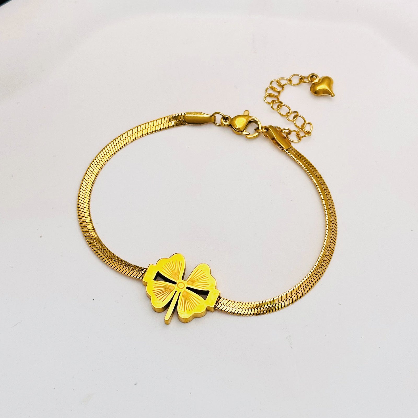 Women's Fashion Temperament Titanium Steel No Fading Clavicle Chain Ea
 Product information:
 
 Treatment Process: Electroplating
 
 Color: four-leaf clover necklace Golden-896, four-leaf clover bracelet gold 5155, earrings gold 7619
 Women's JewelryShoparamas.comFading Clavicle Chain Earrings Suit