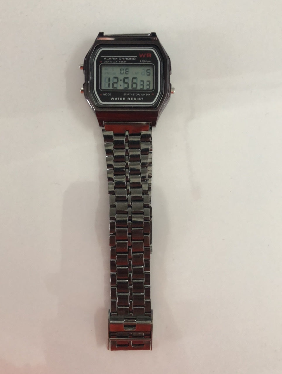 WR F91W Steel Band Electronic Watch
 Display type: Number
 
 Waterproof: No
 
 Movement type: Electronic
 
 Thickness: 10mm
 
 Dial diameter: 20mm
 
 Crown Type: Spiral Crown
 
 Mirror material: plast0Shoparamas.comWR F91W Steel Band Electronic Watch